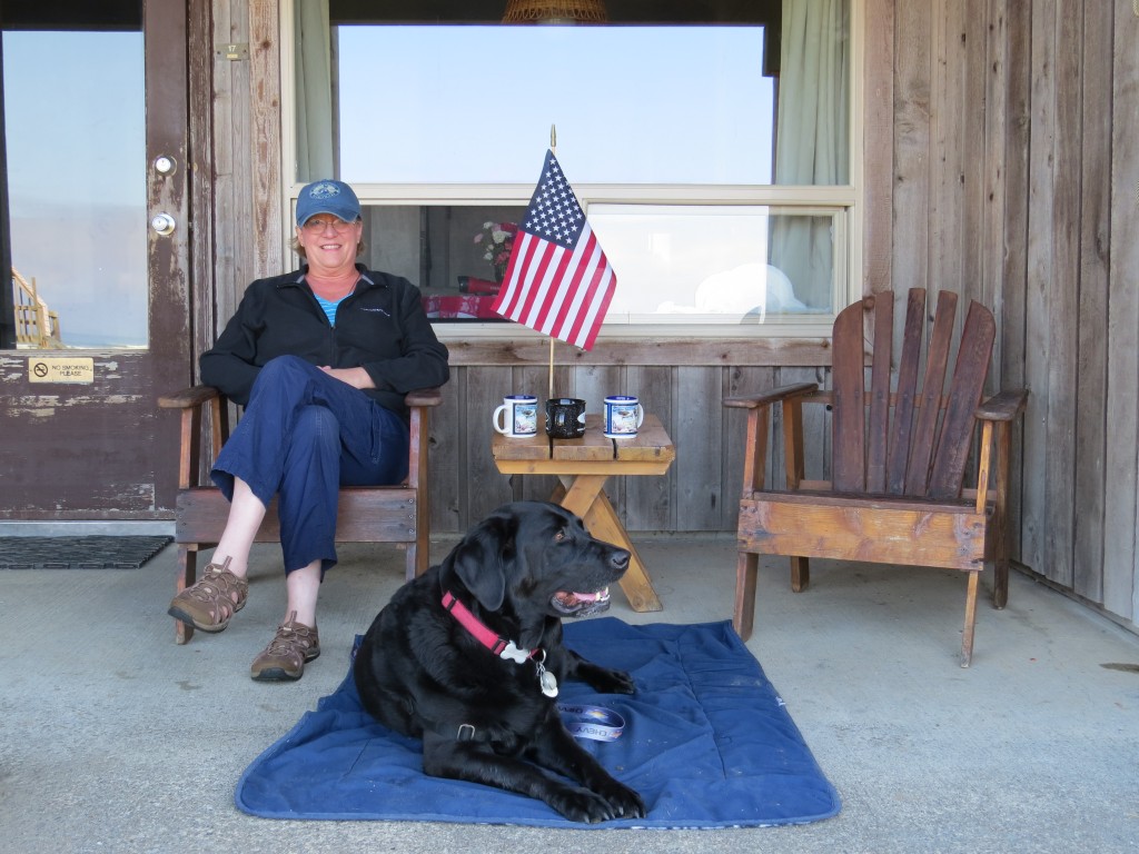 Pam with our Lab Misty at the ocean