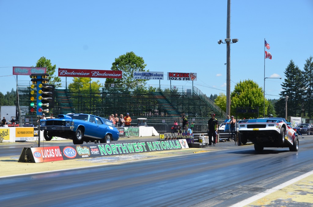 Jim Doyle photo. Same launch point, exact same chassis setup, just a Hughes TH-400 transmission that works! Edwards & Young Small-block Chevy power, normally aspirated 406! Both Chev's are sponsored by Handan Trailer Repair & Sales!