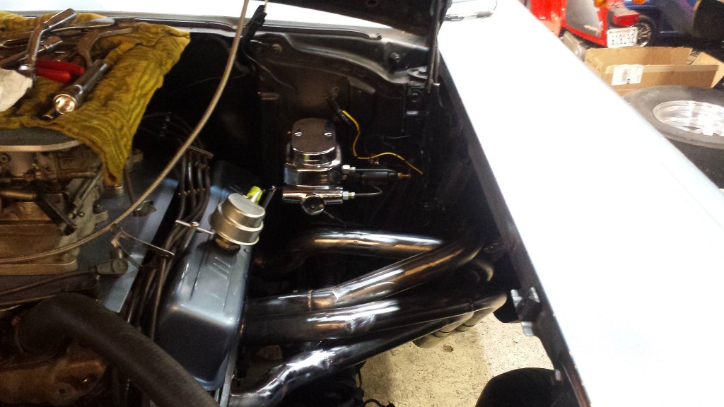 Driver's side header finish welded, new master cylinder and lines installed for bleeding the brakes