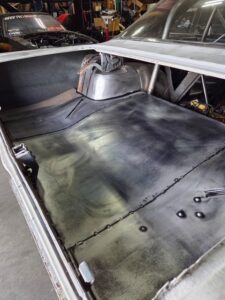 Finished wheel tubs & trunk floor on Chevy II